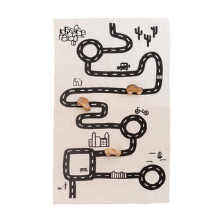 Children's play mat with road design and small figures on a white background