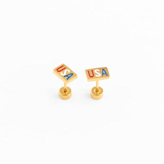 Gold 'USA' letter block earrings on a white background