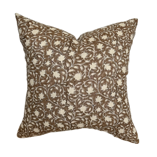 Decorative pillow with floral pattern on a white background