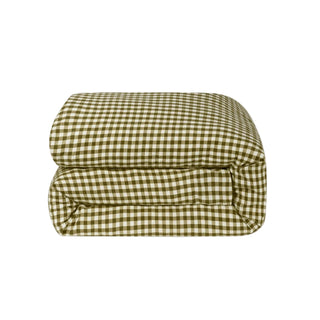 Green and white checkered blanket on a light gray background