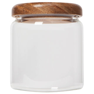 White glass jar with a wooden lid on a white background