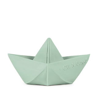 Light green paper boat with 'Ole & Carol' branding on a white background