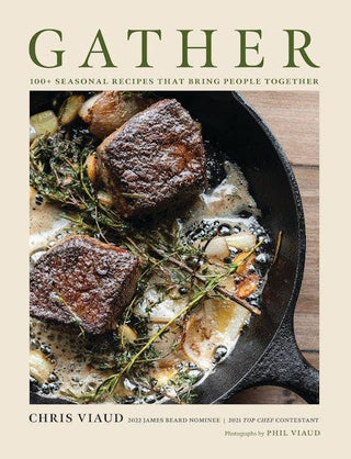 Cookbook cover with a skillet of food and the title 'Gather' on a beige background
