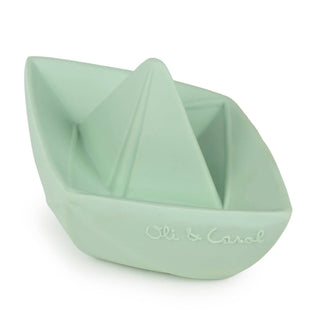 Light green boat-shaped toy with 'Oli & Carol' branding on a white background