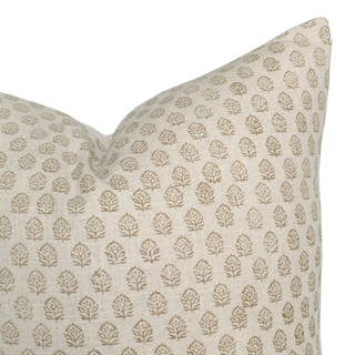 Patterned pillow with a subtle design on a beige background