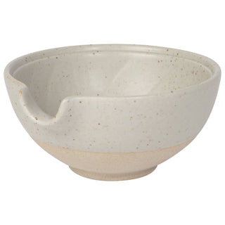 Beige ceramic bowl on a white background