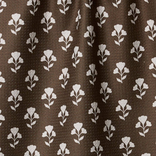 Brown fabric with white floral pattern