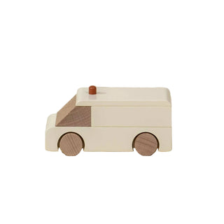 Wooden toy van on a beige background