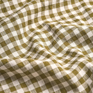 Woven fabric with a green and white checkered pattern