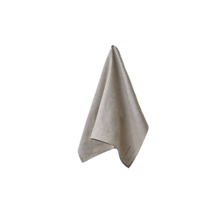 Gray towel hanging on a white wall