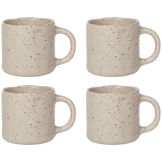 Four beige speckled ceramic mugs on a white background