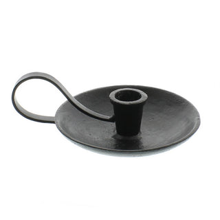 Black metal candle holder on a white background