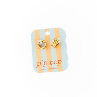 Gold earrings on a striped 'pip pop' card against a white background