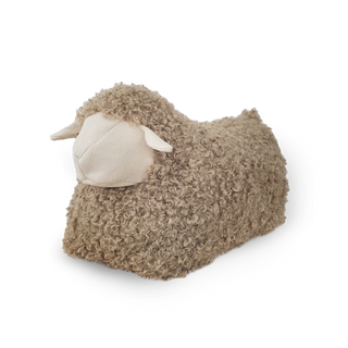 Plush sheep toy on a white background