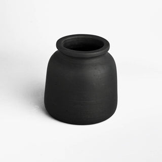 Black ceramic vase on a white background