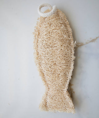 Natural fiber loofah on a light background