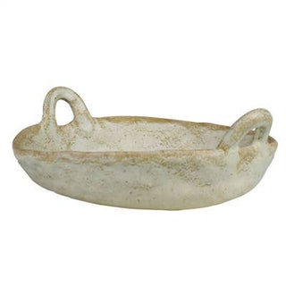 Decorative ceramic dish with handles on a white background