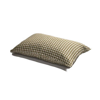 Checkered pillow on a light gray background