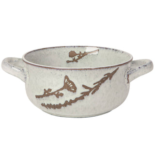 A ceramic bowl with two side handles, featuring a speckled off-white glaze and a rustic brown branch pattern decorated with small ginkgo leaves.