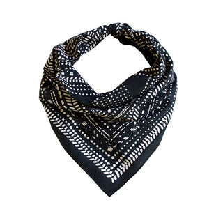 Black and white patterned bandana on a light gray background