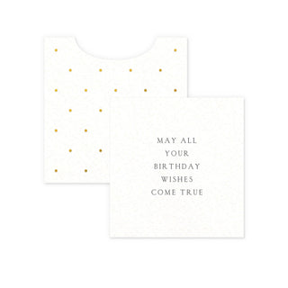 White card with gold polka dots and text on a white background