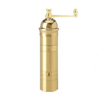 Gold pepper grinder on a white background