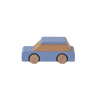 Wooden toy car with a blue body and brown roof on a beige background