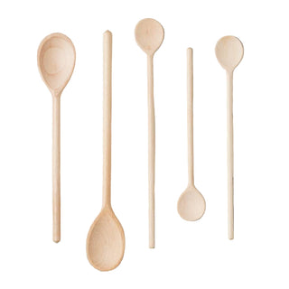 Set of wooden spoons on a marble surface