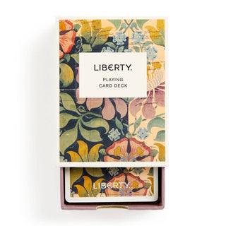 Floral-patterned playing card deck with 'Liberty' branding on a white background