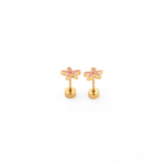 Pair of gold flower-shaped earrings on a white background
