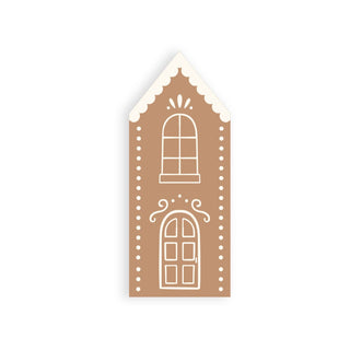 Decorative gingerbread house template with white trim on a white background