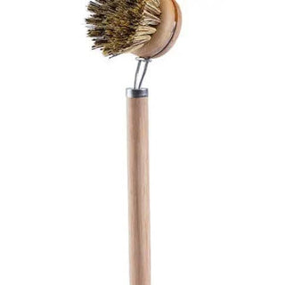 Bristle brush with wooden handle on a white background