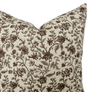 Floral patterned pillow on a white background