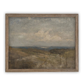 Framed landscape painting with a cloudy sky and rolling hills.