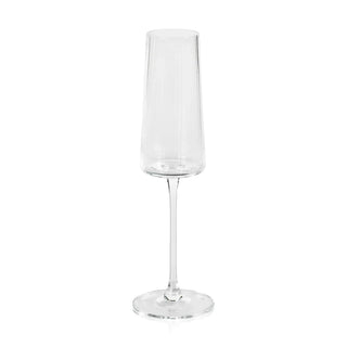 Clear glass champagne flute on a white background