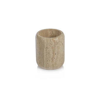 A beige travertine marble tumbler with a cylindrical shape on a white background.
