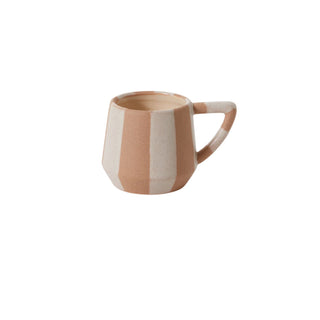 Two-tone ceramic mug with a handle on a white background