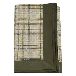 Folded fabric with plaid pattern on a white background
