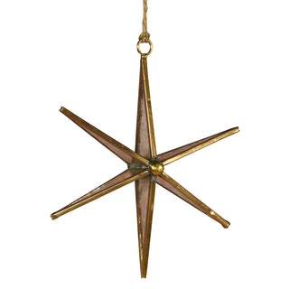 Decorative star-shaped pendant hanging from a string on a white background