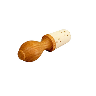 Wooden pepper grinder with cork top on a white background