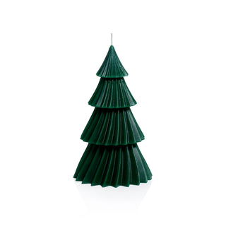 Green tree-shaped candle on a white background