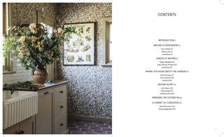 Interior design layout with floral arrangement, framed picture, and text on a white background