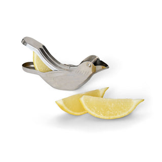 Metal lemon squeezer with sliced lemons on a white background