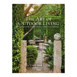 Book cover of 'The Art of Outdoor Living' with a garden scene on the cover.