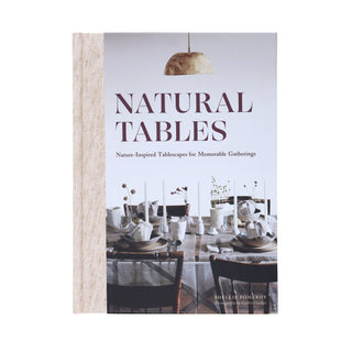 Book titled 'Natural Tables' with a cover featuring a dining table setting.