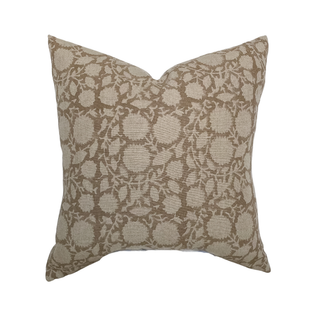 Decorative pillow with a floral pattern on a white background