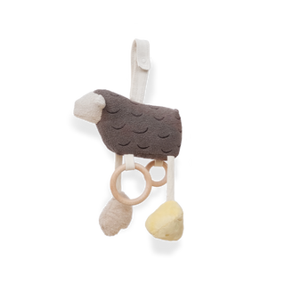 Baby teething toy with soft textures and wooden ring on a white background