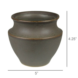Dark brown ceramic vase with dimensions on a white background