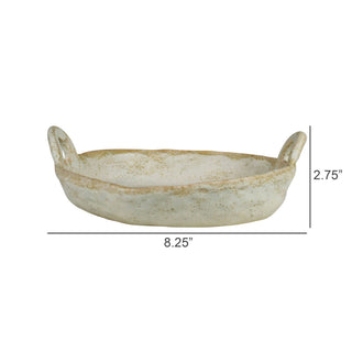 Decorative bowl with handles on a white background