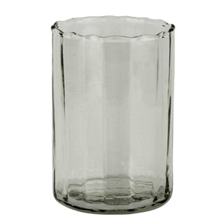 Clear glass vase with a textured surface on a white background